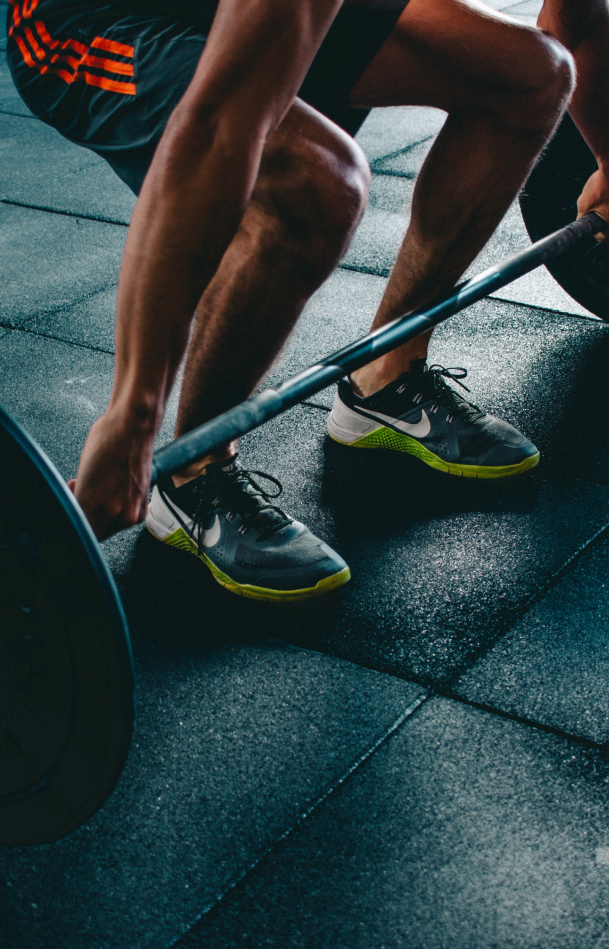 man performing a deadlift