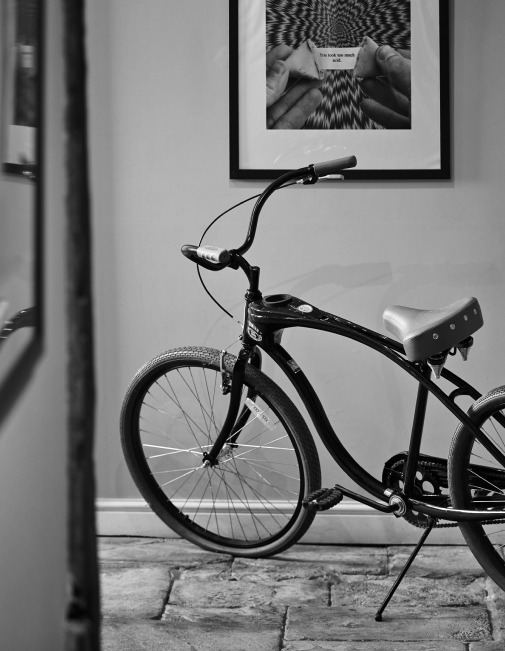 A bicycle parked inside of the Longbarn