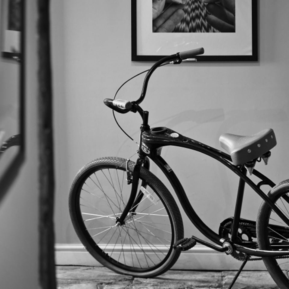 A bicycle parked inside of the Longbarn